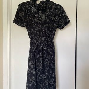 Abstract face art black dress